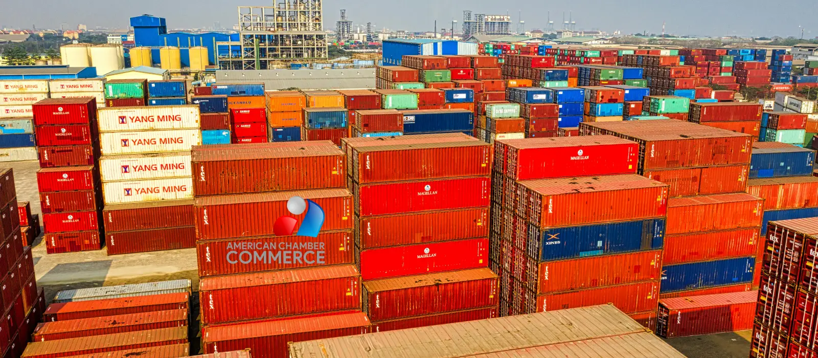 Stacks of shipping containers at a commercial port